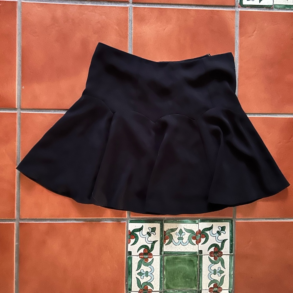 CeCe black skirt. Pleaded.